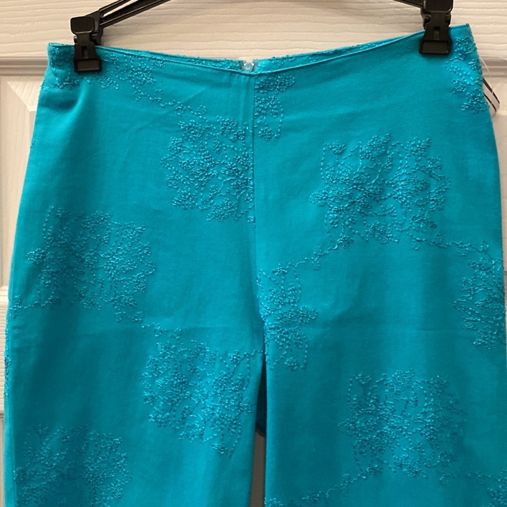 Belle Sport- Teal Embroidered back zip pants - size 4. NWT